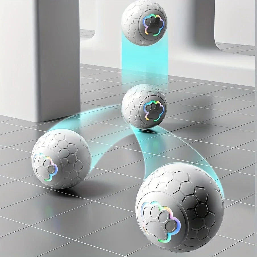 Balle interactive blanche qui rebondit automatiquement pour chien, avec LED lumineuse â Disponible chez Museau Dort.