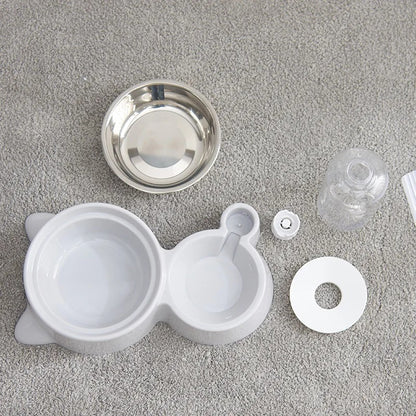 Vue éclatée des composants d’une gamelle automatique pour chien avec bol inox, base plastique et réservoir. Disponible chez Museau Dort.