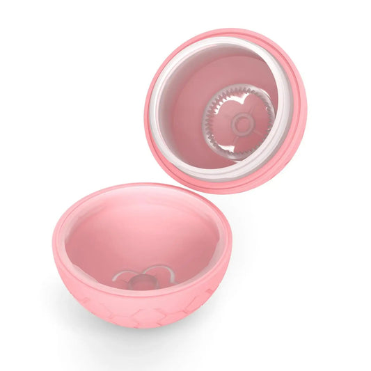 Coquille rose de rechange pour balle interactive pour chien sans mécanisme. Disponible chez Museau Dort