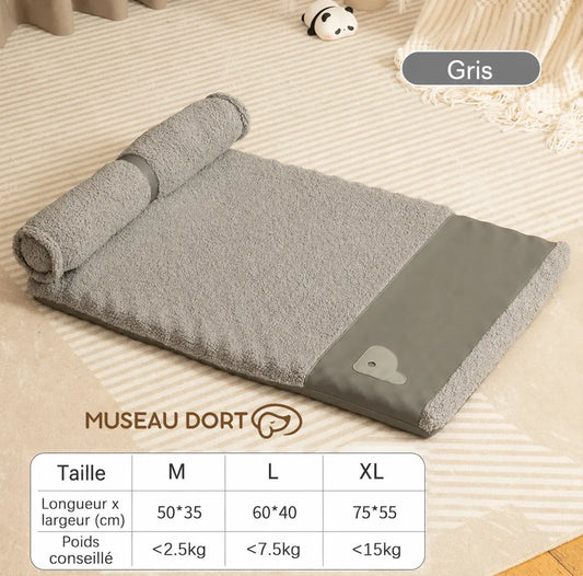 Coussin pour chien gris avec traversin et guide des tailles M, L et XL adapté aux petits chiens âgés jusqu’à 15 kg.
