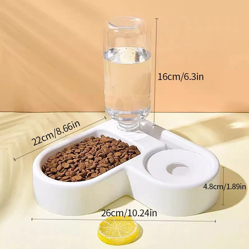 Gamelle cœur blanche avec distributeur d’eau automatique et dimensions visibles. Pour chien et chat. Disponible chez Museau Dort