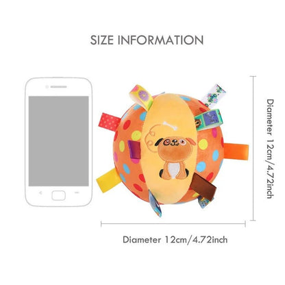 Ballon pour chien de 12 cm de diamètre avec rubans colorés et motif chiot, comparé à un smartphone. Disponible chez Museau Dort.