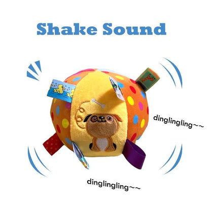 Ballon en tissu pour chien avec sons à secouer, rubans sensoriels et motif brodé de chiot. Disponible chez Museau Dort.