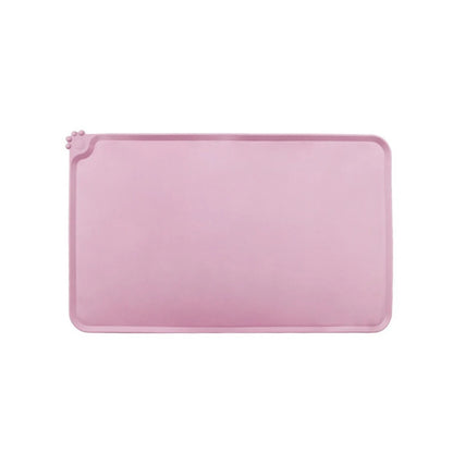 Tapis gamelle chien en silicone rose, antidérapant et imperméable pour animaux. Disponible chez Museau Dort.