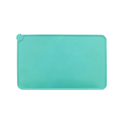 Tapis gamelle chien en silicone vert, antidérapant et imperméable pour animaux. Disponible chez Museau Dort.